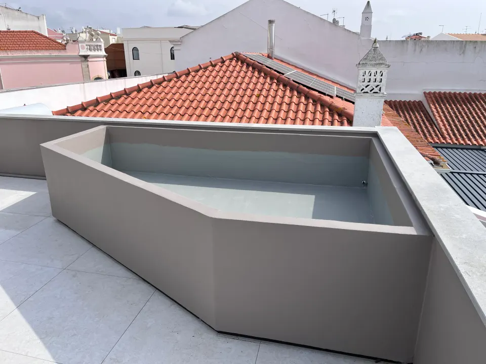Terrace with planters and jacuzzi, after